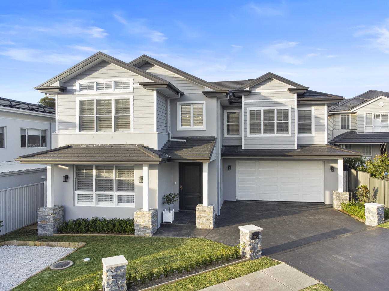 The Liana by Rosewood Homes with Atura roof tiles in Barramundi